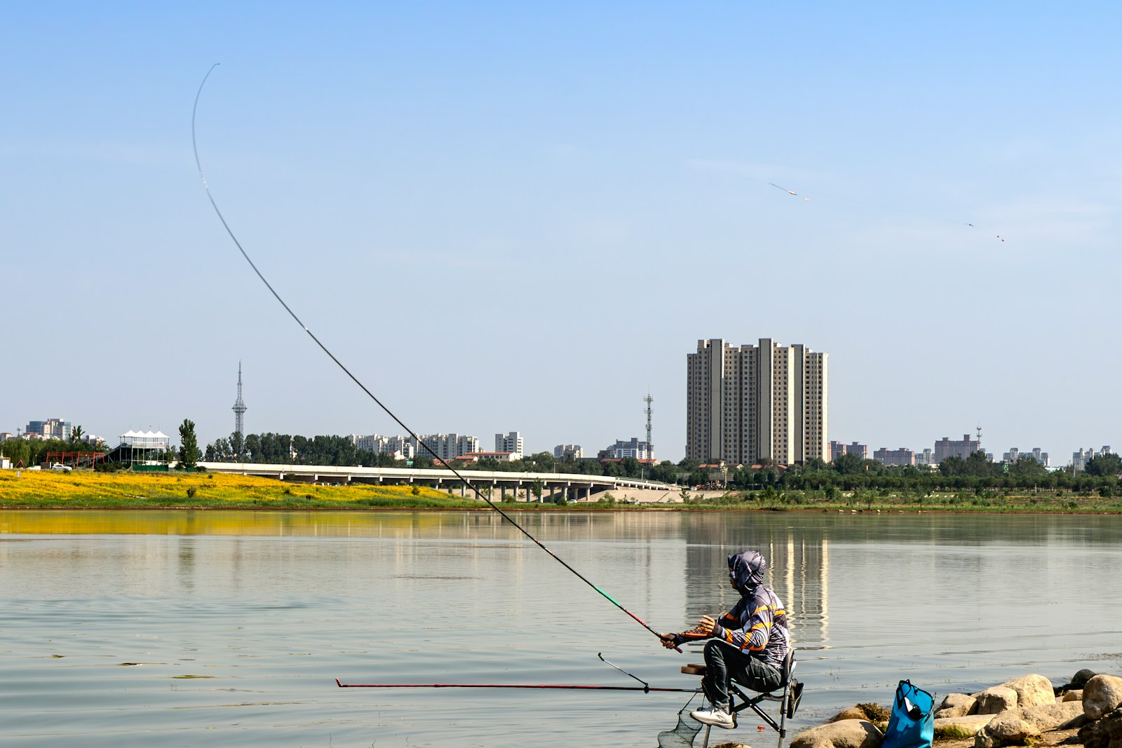 Angler casting from the edge of inshore water